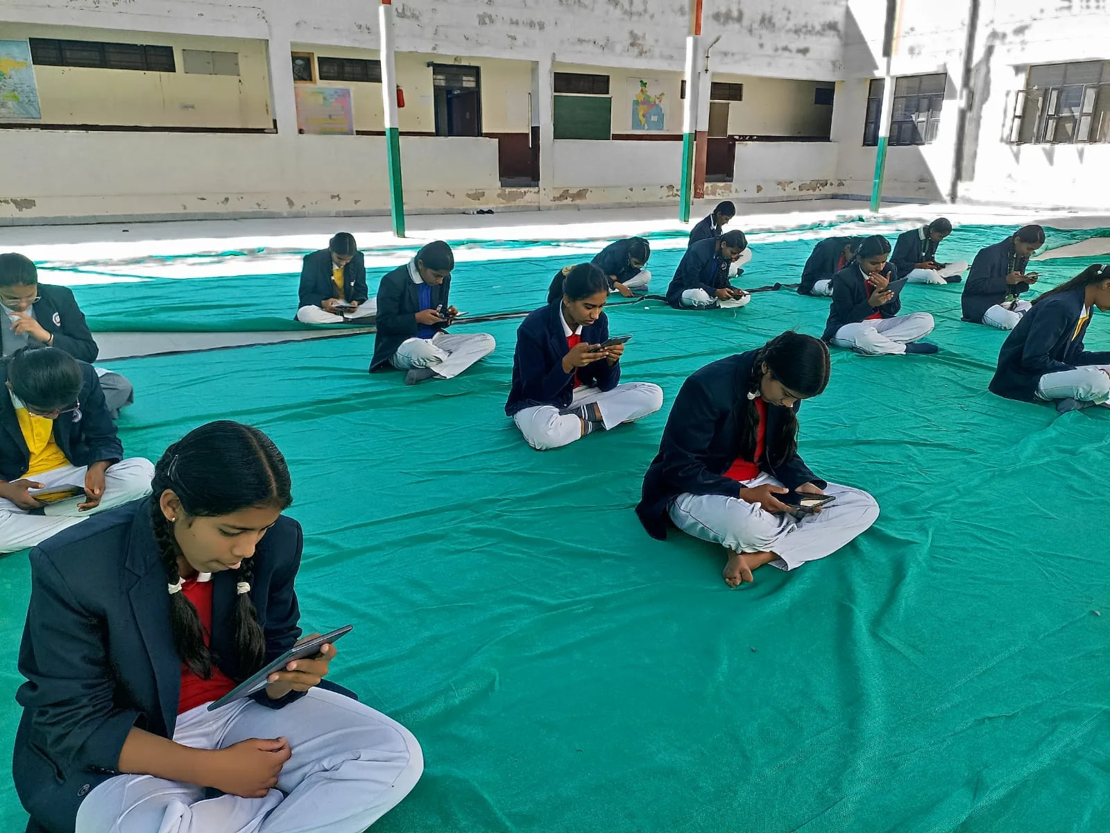 Students taking part in a digital learning activity at their school