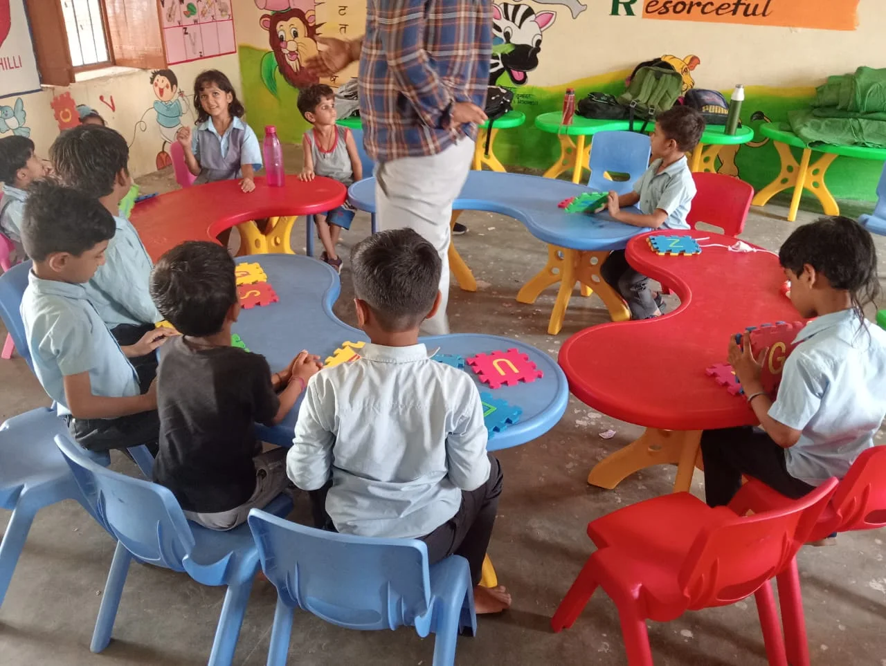 Children learning through playful classroom activities in Sambhavna