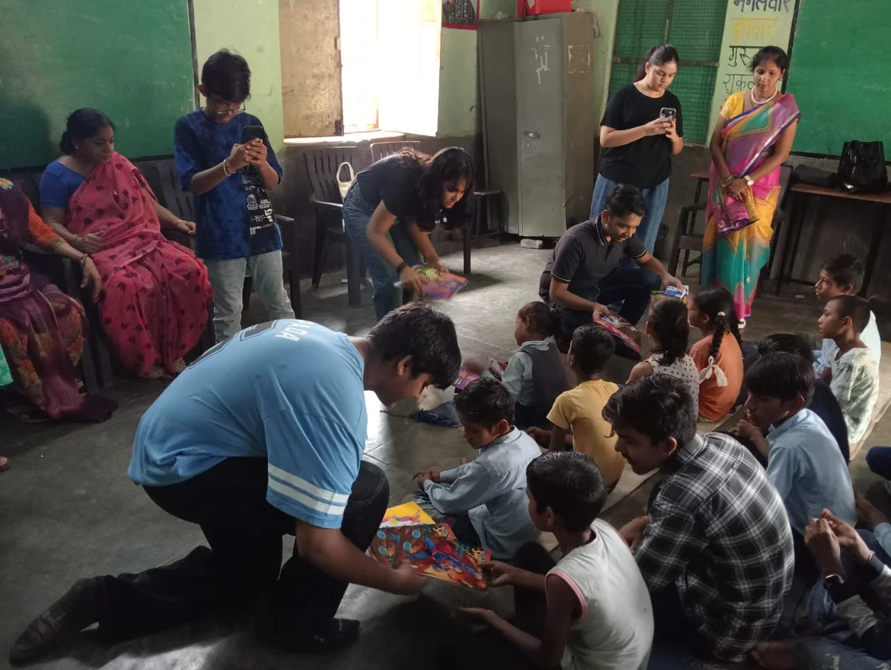 Volunteers supporting a classroom activity