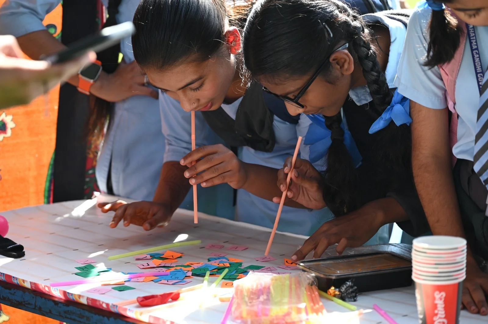 Students taking part in a colourful hands-on activity