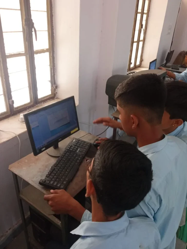 Students practising computer skills