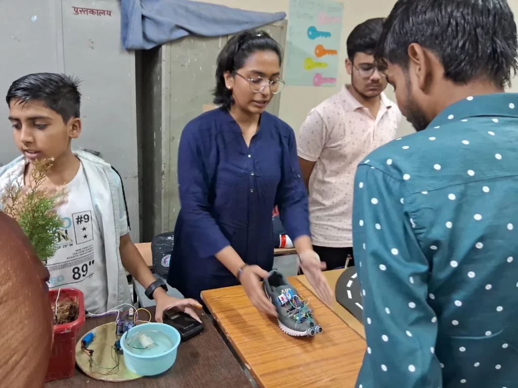 Students demonstrating a hands-on technology project