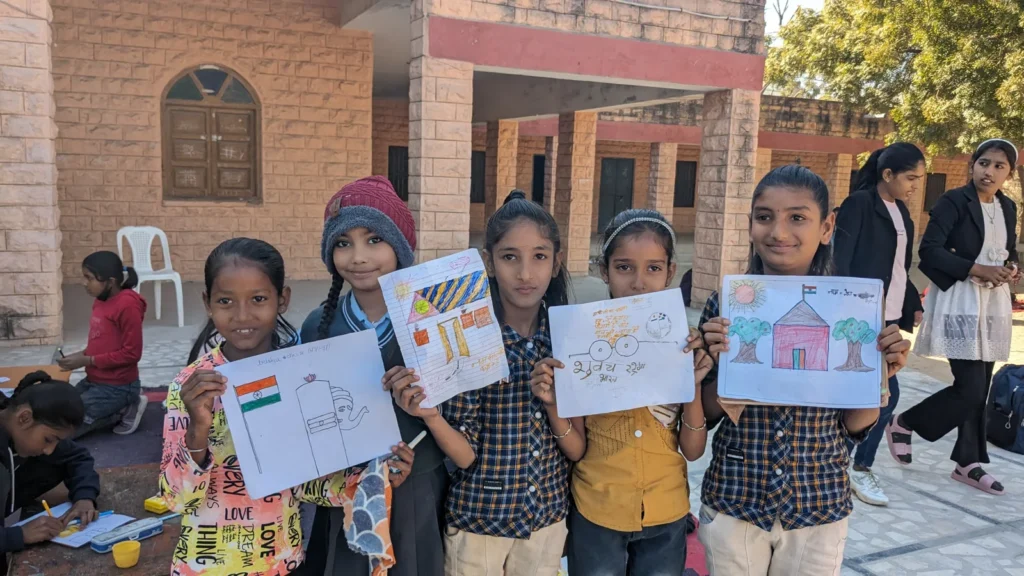 Students displaying health and cleanliness posters